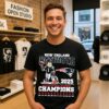 New England Patriots Afc Champions 2026 Pat Patriot Holding Trophy Mascot T-Shirt