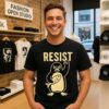 Penguins Resist Hand Off ’26 T-Shirt